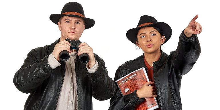 Young explorers, one with binoculars,dressed to find adventure in Federal Way.