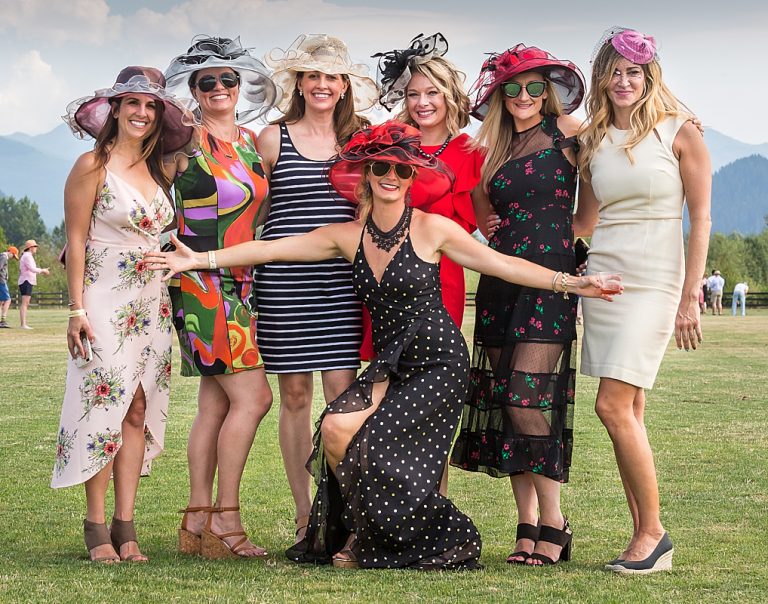 Women in party dresses at the annual Seattle Polo Club event.